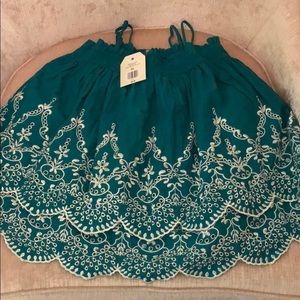 Strapped tank top dressy top.